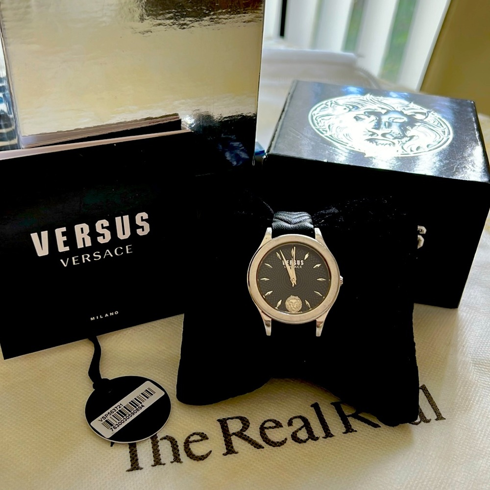 Versus by Versace Woman's silver/black classic design watch-used-works great